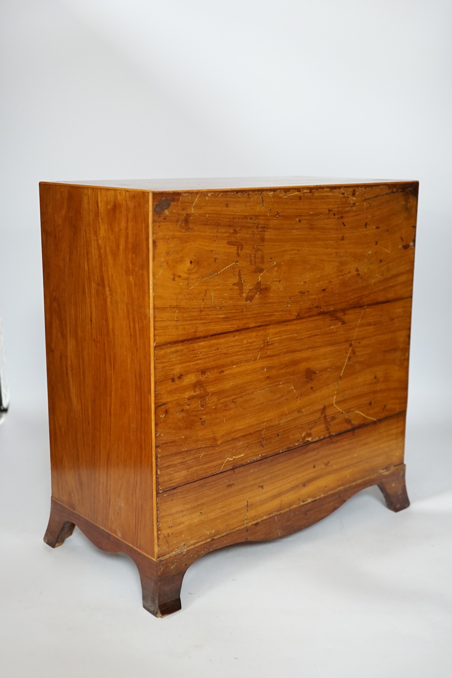 A George III style rosewood and tulipwood banded miniature two door chest, fitted with four graduated drawers, 36 x 35cm